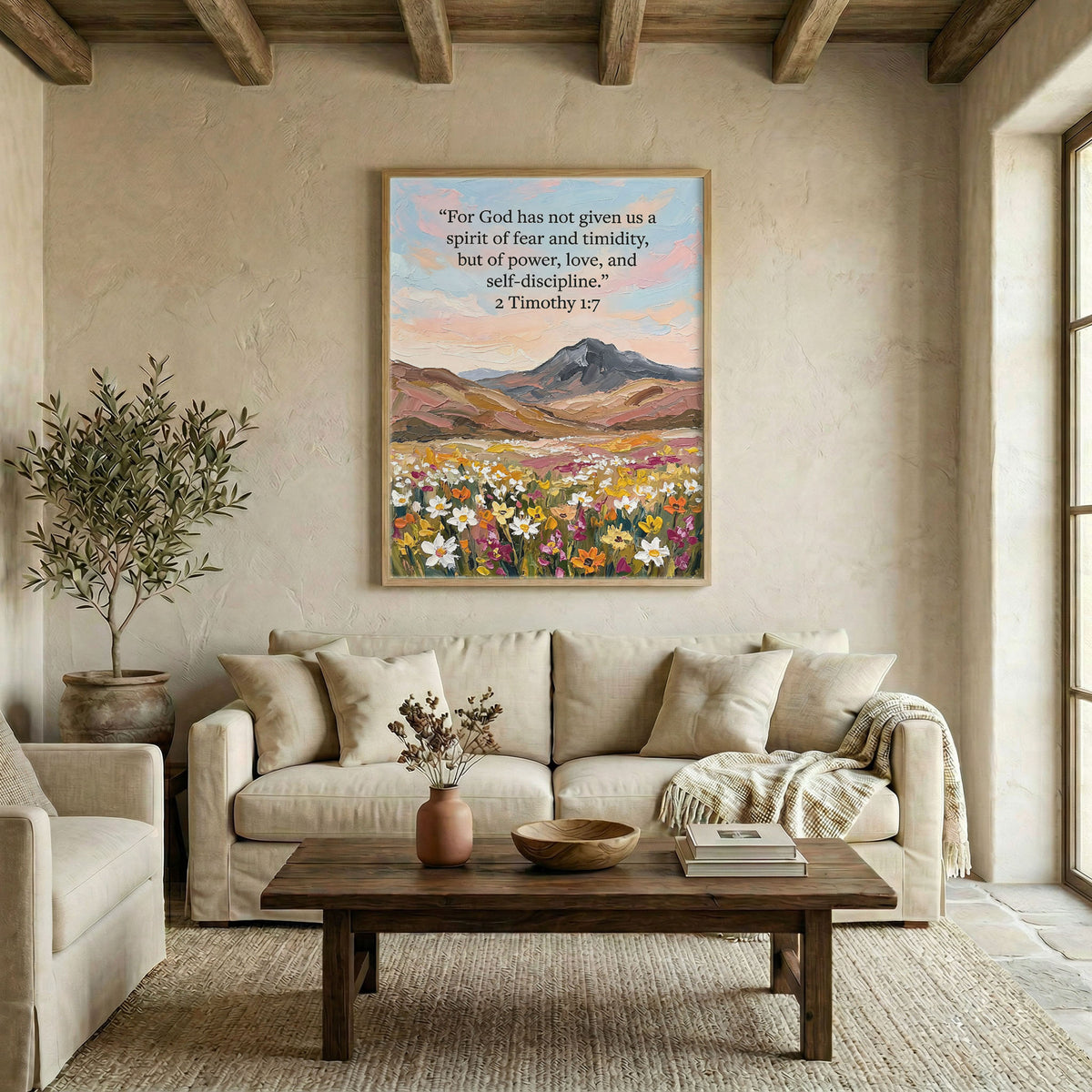 Large mountain wildflower scripture canvas in wood frame above linen sofa in living room