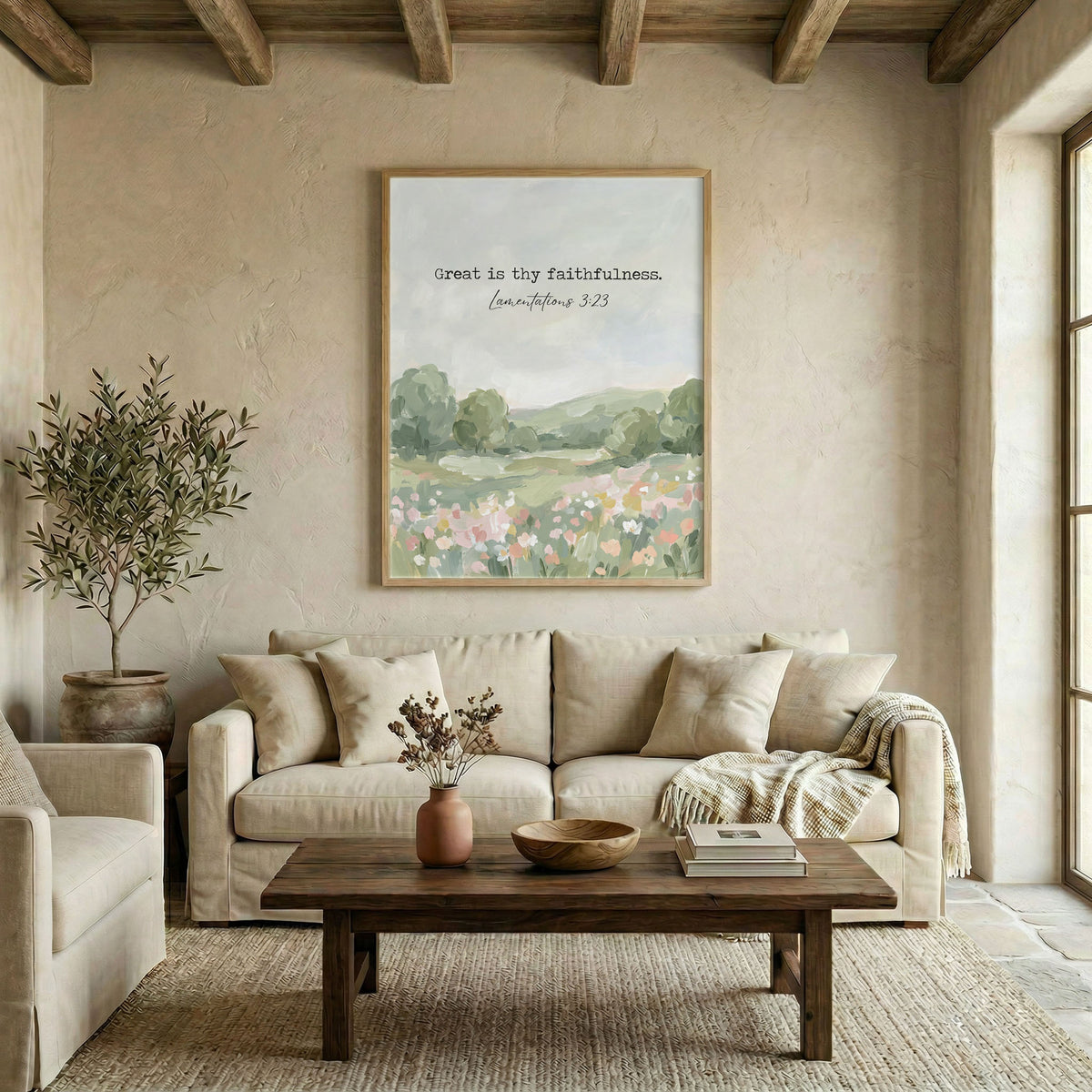Large green landscape scripture canvas in wood frame above linen sofa in neutral living room