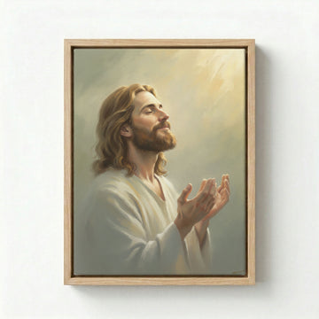 Black framed canvas with Jesus Christ praying design and divine light rays on a light grey background