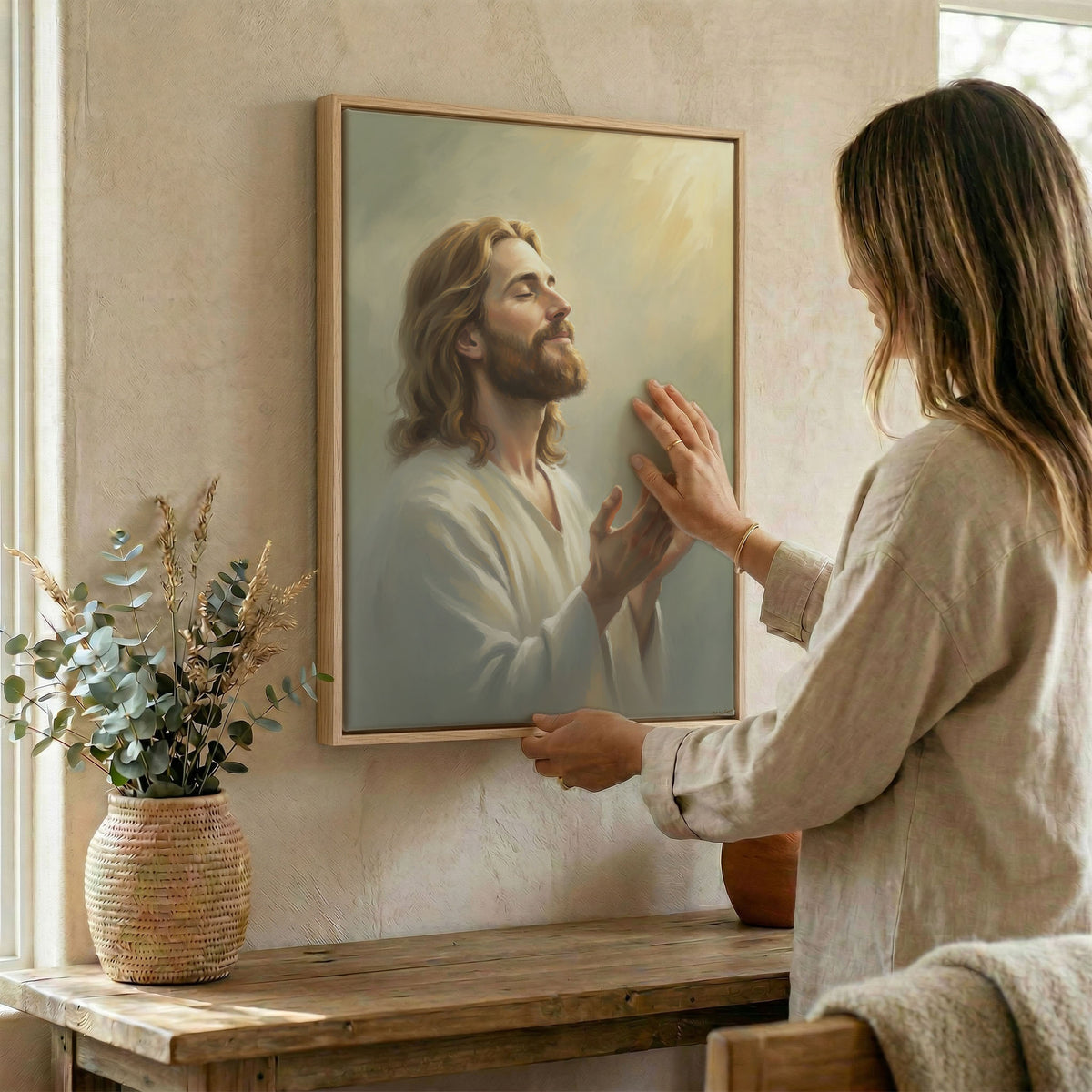 Darker interior room showcasing the illuminated divine light rays of the Jesus Christ praying canvas art.