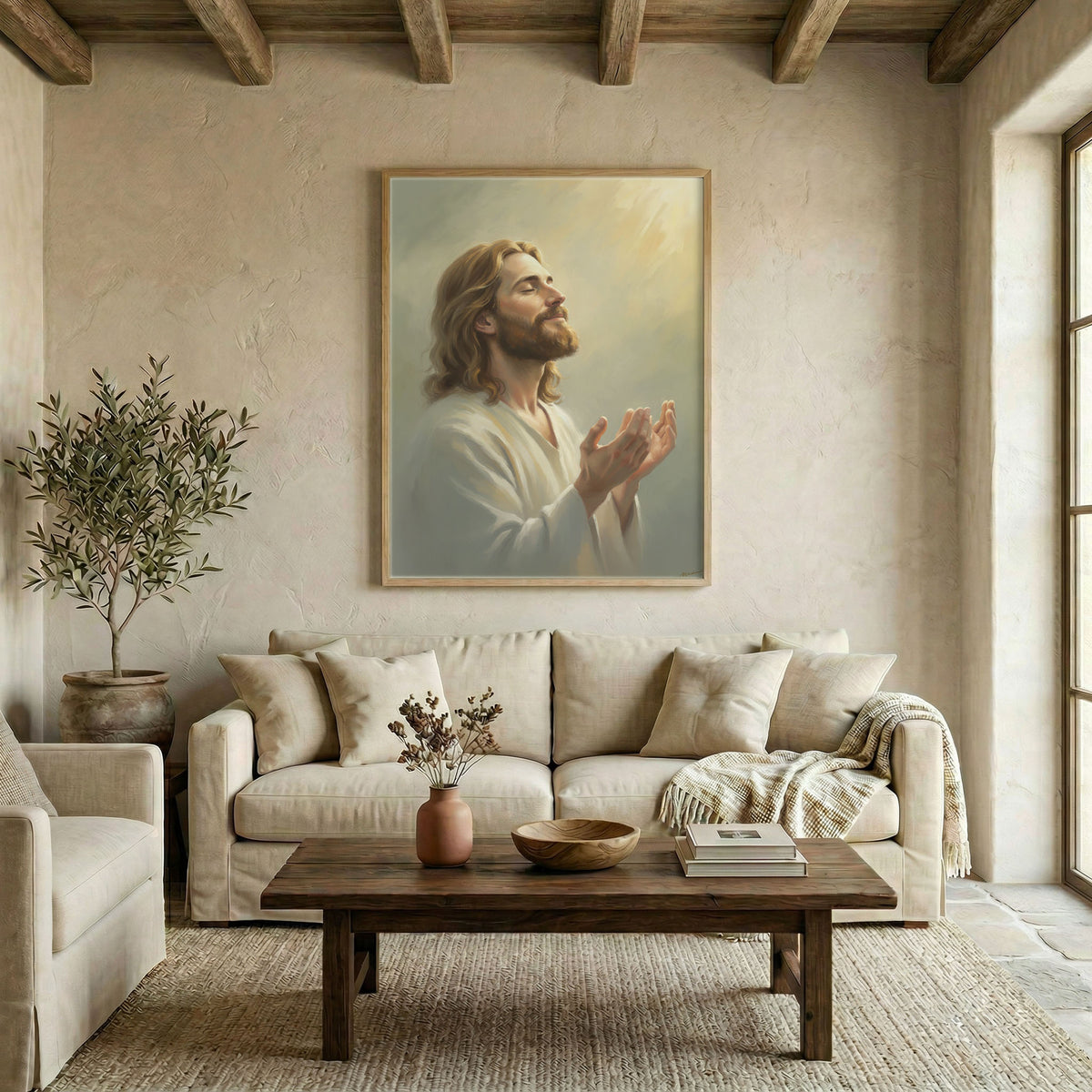 Modern living room featuring Jesus Christ praying canvas art hanging above a beige sofa with warm decor.