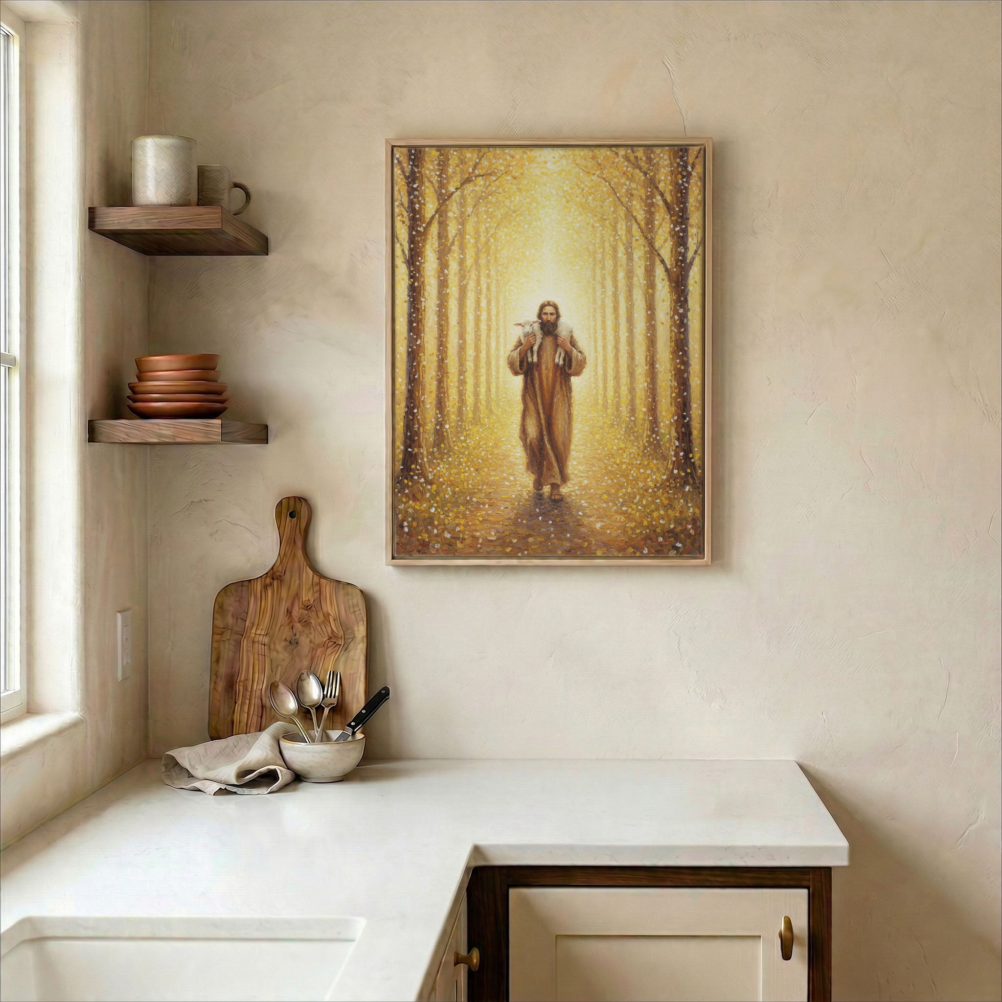 Bright kitchen wall with Jesus Good Shepherd canvas print beside open shelves and wood cutting board