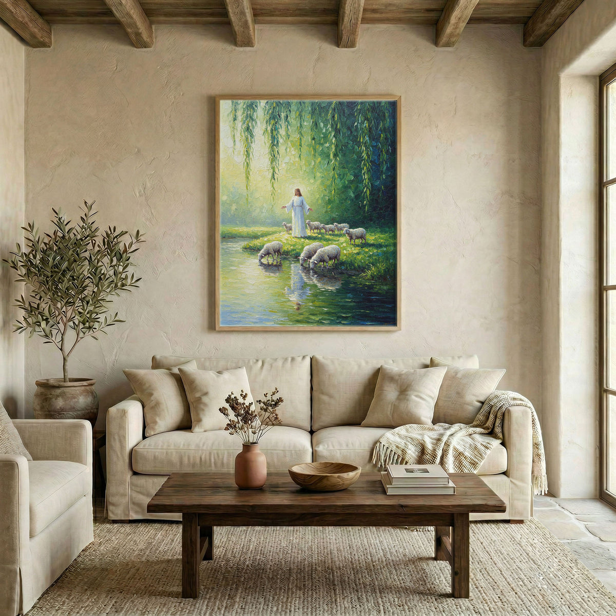 Large Jesus and sheep by pond canvas in wood frame above linen sofa in warm neutral living room