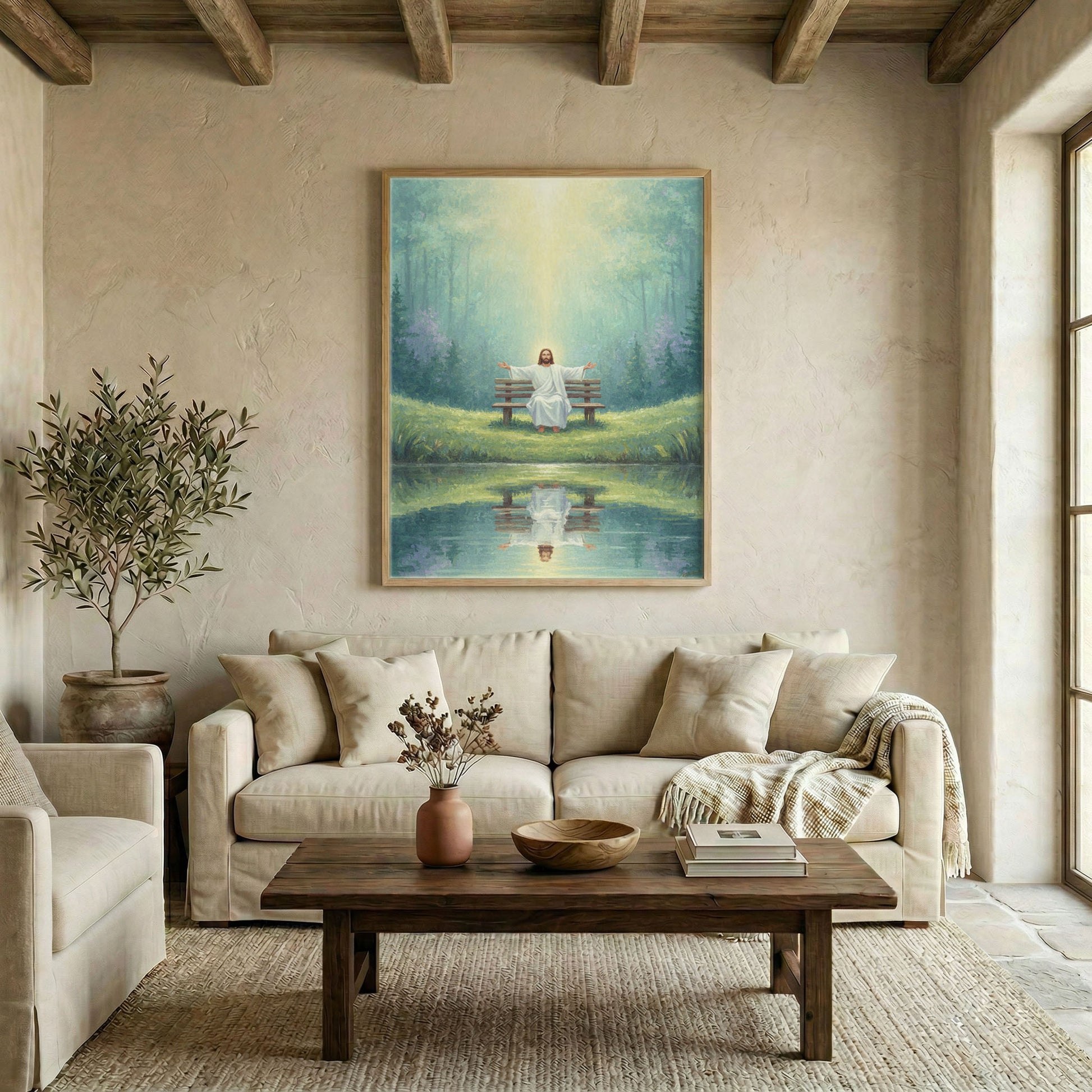 Large Jesus sitting by pond canvas in wood frame above linen sofa in warm neutral living room