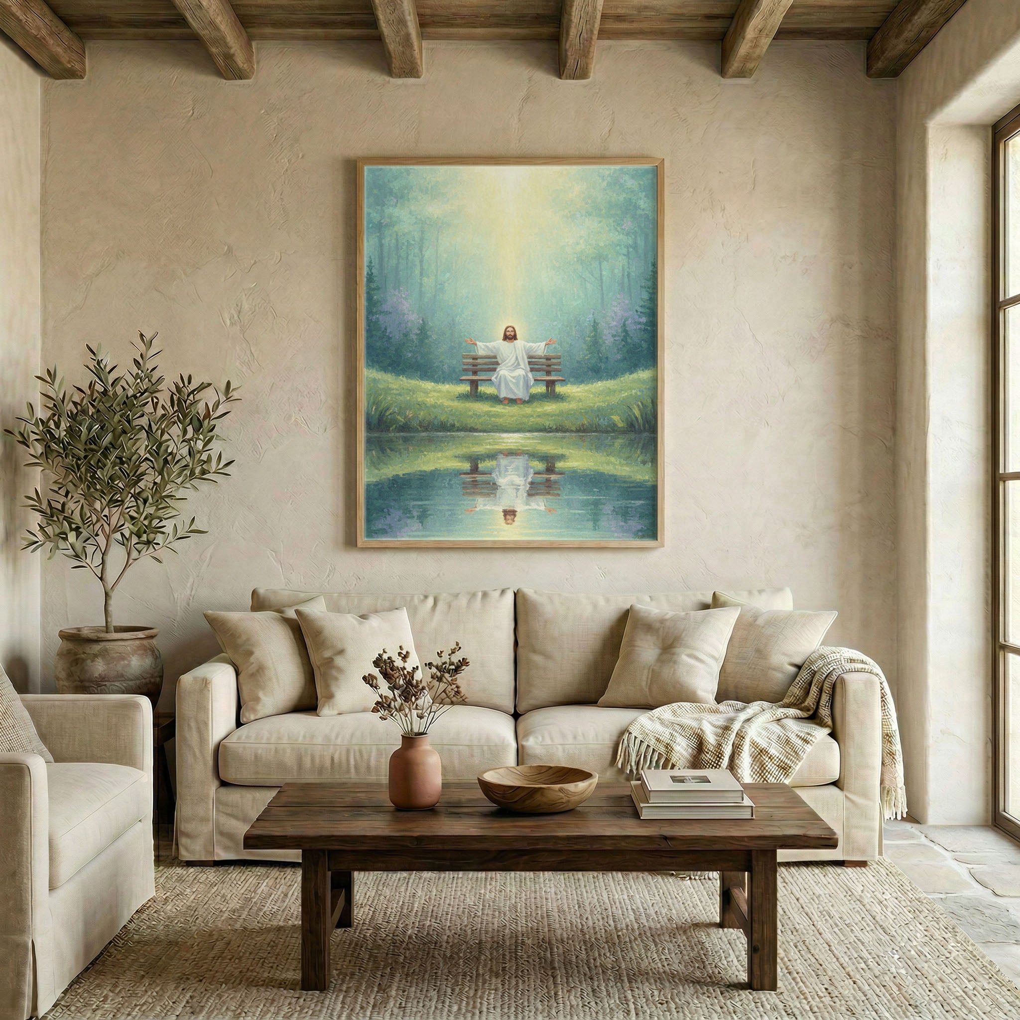 Large Jesus sitting by pond canvas in wood frame above linen sofa in warm neutral living room