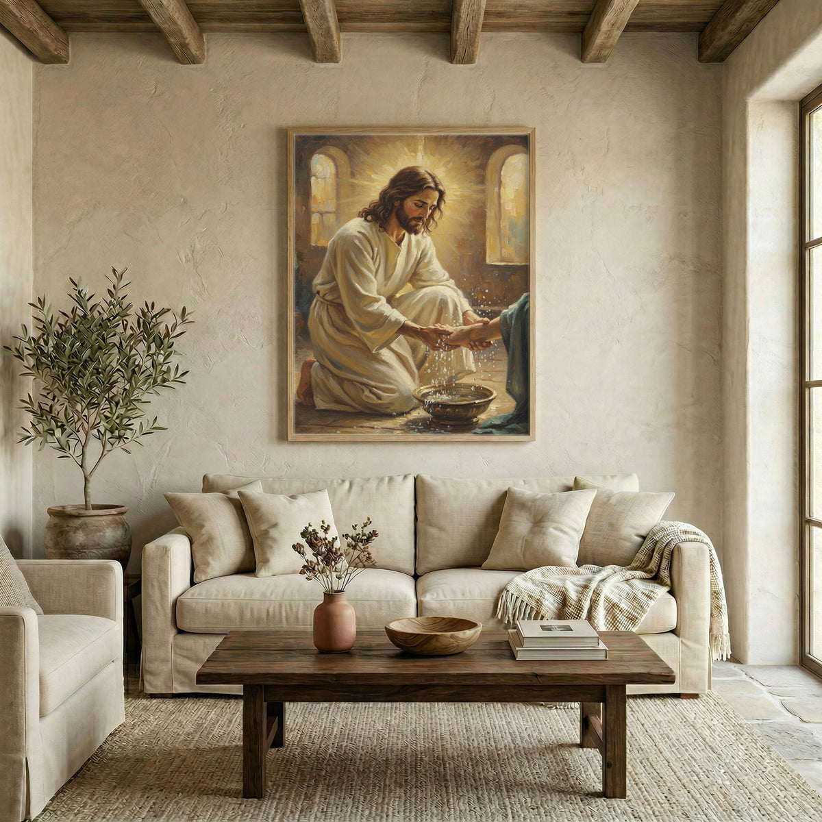 Large Jesus washing feet canvas in wood frame above linen sofa in warm neutral living room