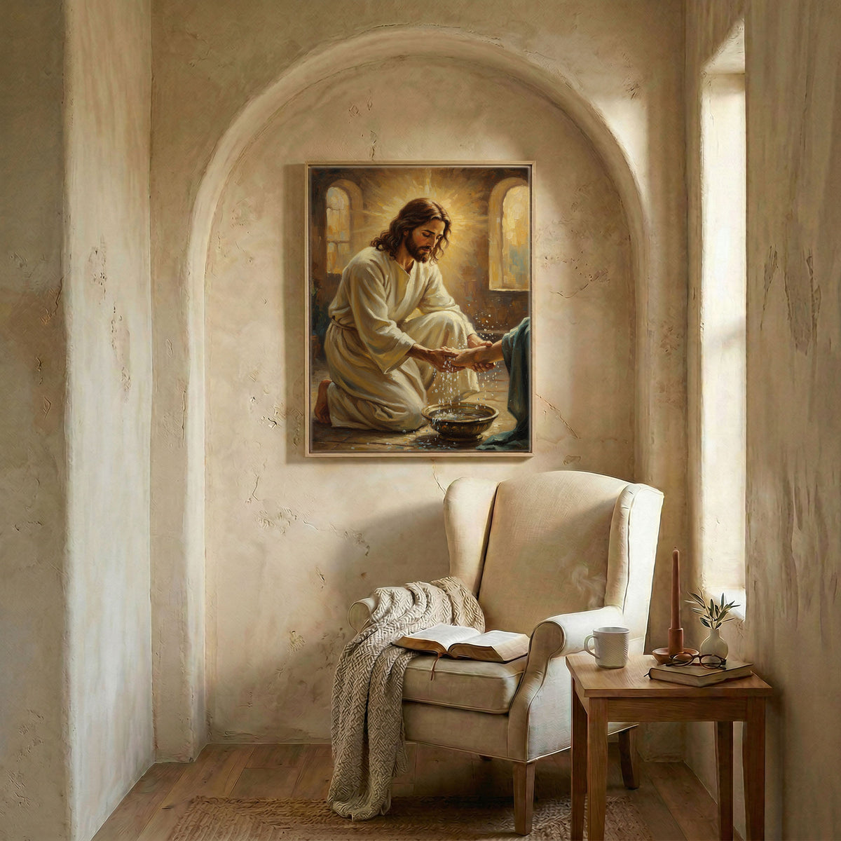 Jesus washing feet art in wood frame in arched alcove above wingback chair with open Bible and candle