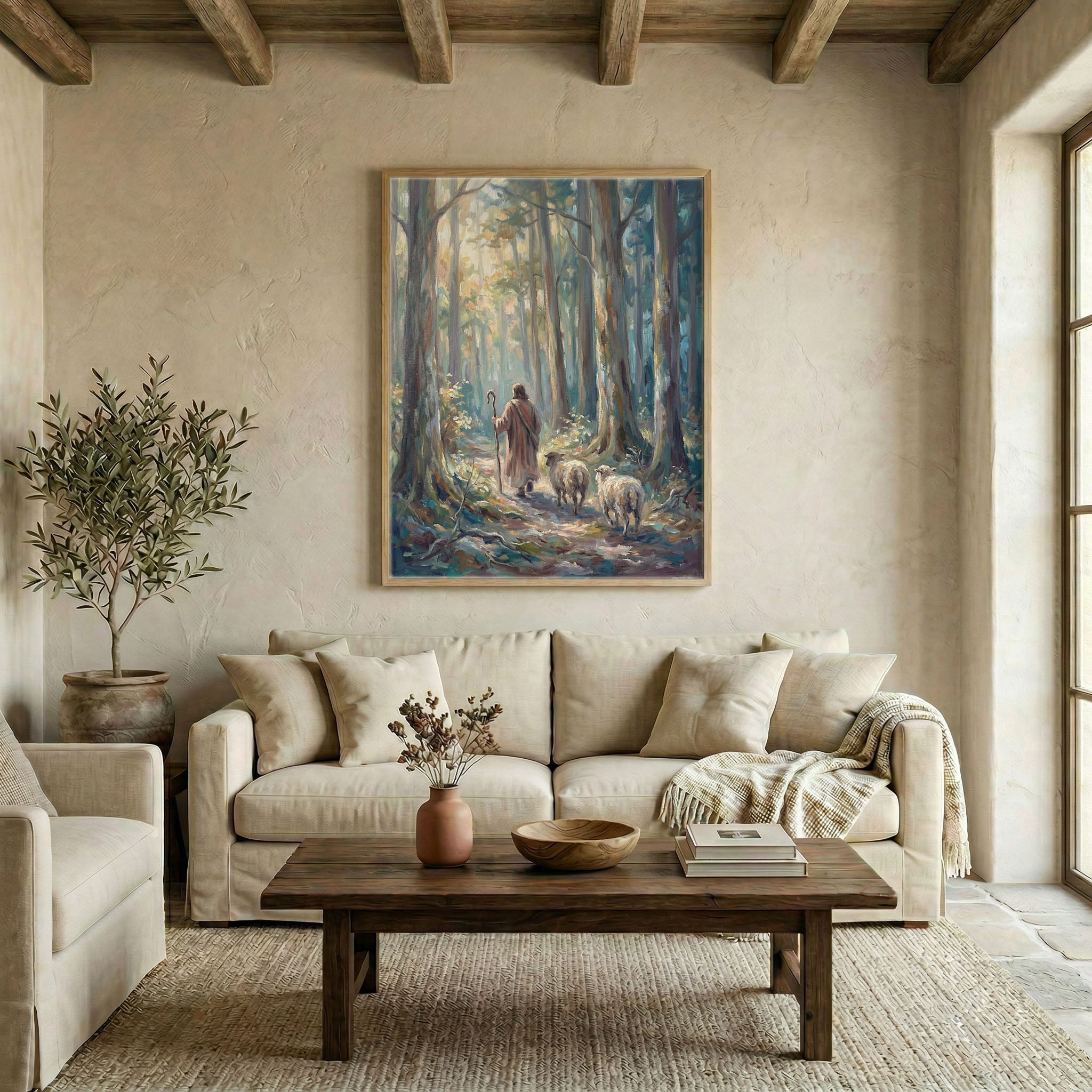 Large Good Shepherd sunlit forest canvas in wood frame above linen sofa in warm neutral living room